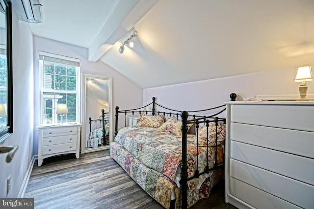 111 Seabright Way Unit E3, Rehoboth Beach, DE 19971 - bedroom featuring wood finished floors, vaulted ceiling, a wall mounted air conditioner, track lighting, and baseboards