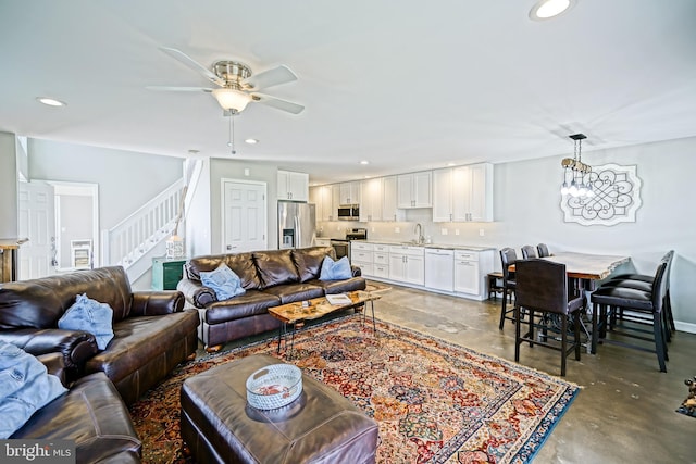 111 Seabright Way Unit E3, Rehoboth Beach, DE 19971 - living area with stairs, ceiling fan, recessed lighting, and concrete floors