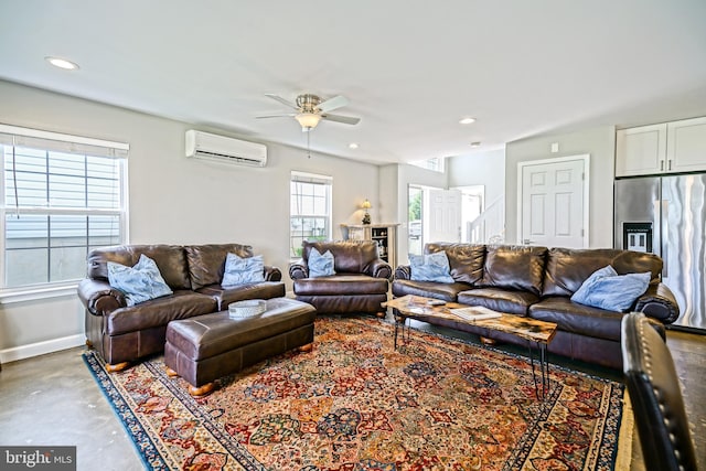 111 Seabright Way Unit E3, Rehoboth Beach, DE 19971 - living room with finished concrete floors, a wall mounted AC, a ceiling fan, baseboards, and recessed lighting