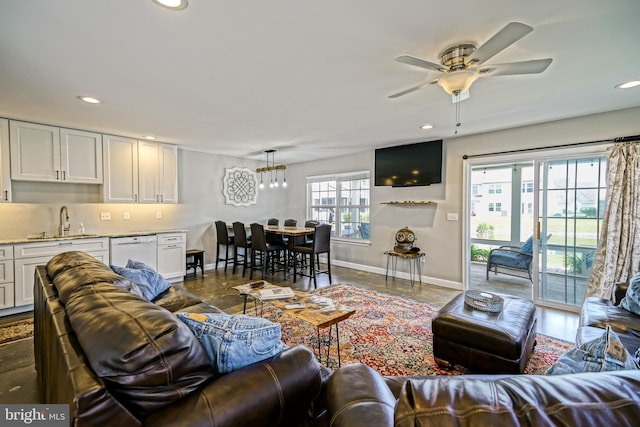 111 Seabright Way Unit E3, Rehoboth Beach, DE 19971 - living room with baseboards, recessed lighting, a ceiling fan, and a chandelier
