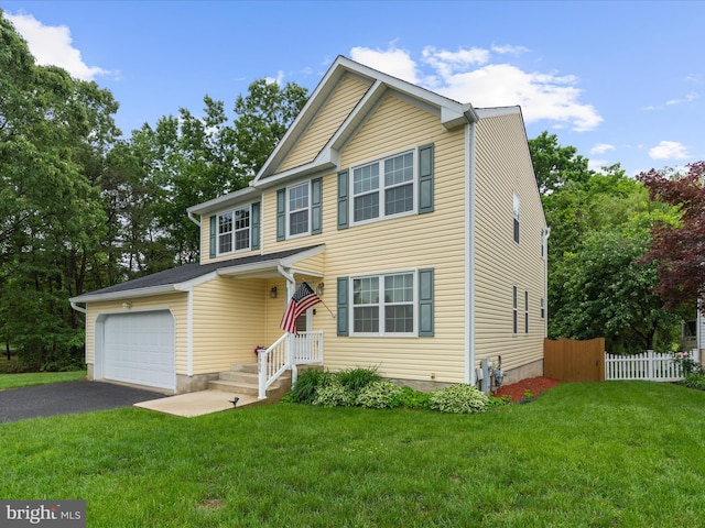 1904 Artillery Ln, Odenton, MD 21113 - view of front of house with asphalt driveway and a garage