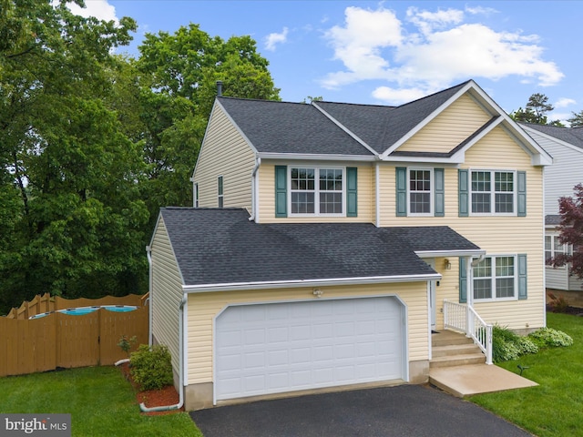 1904 Artillery Ln, Odenton, MD 21113 - traditional home with asphalt driveway and roof with shingles