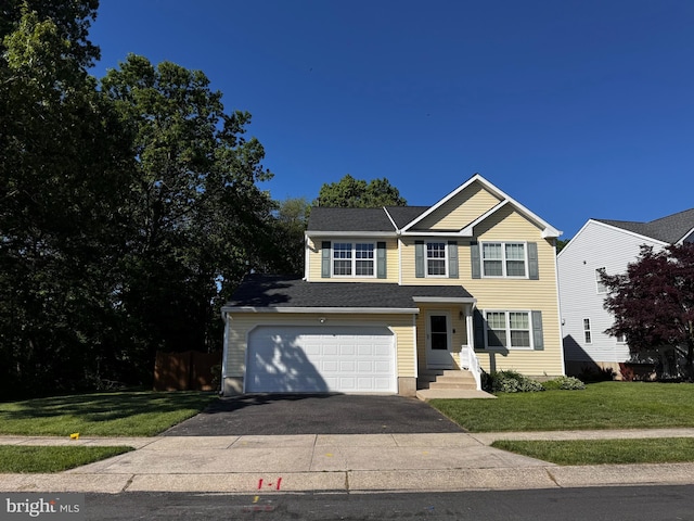 1904 Artillery Ln, Odenton, MD 21113 - view of front facade featuring driveway and a garage