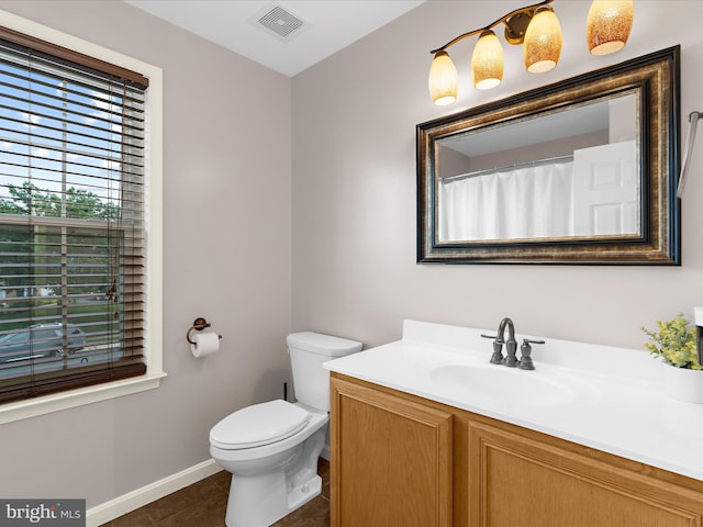 1904 Artillery Ln, Odenton, MD 21113 - full bath with vanity, toilet, baseboards, and tile patterned floors