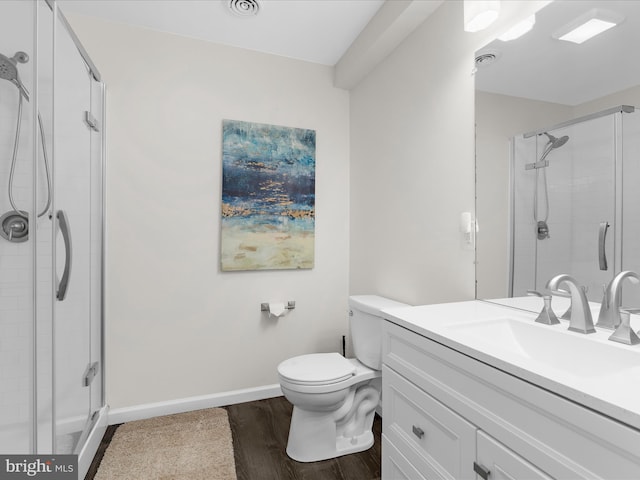 1904 Artillery Ln, Odenton, MD 21113 - full bathroom with a stall shower, vanity, wood finished floors, toilet, and baseboards