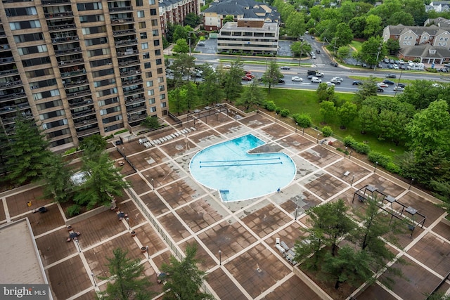 drone / aerial view of a pool