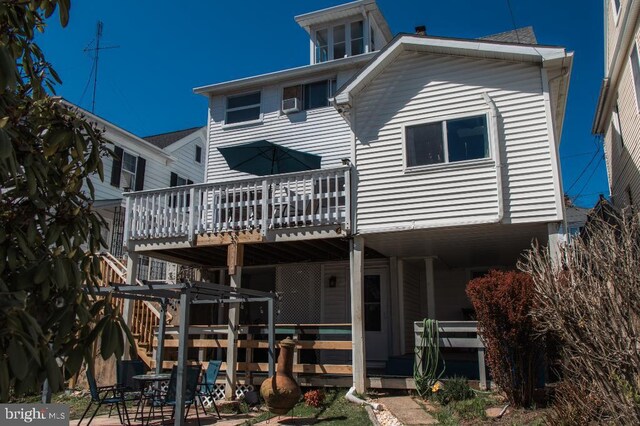 648 E 3rd St, Bloomsburg, PA 17815 - back of house with a wooden deck