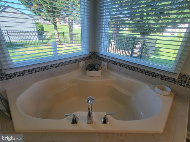 full bath with a garden tub