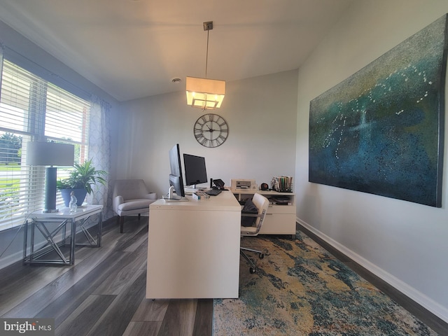 office area featuring dark wood-type flooring and baseboards
