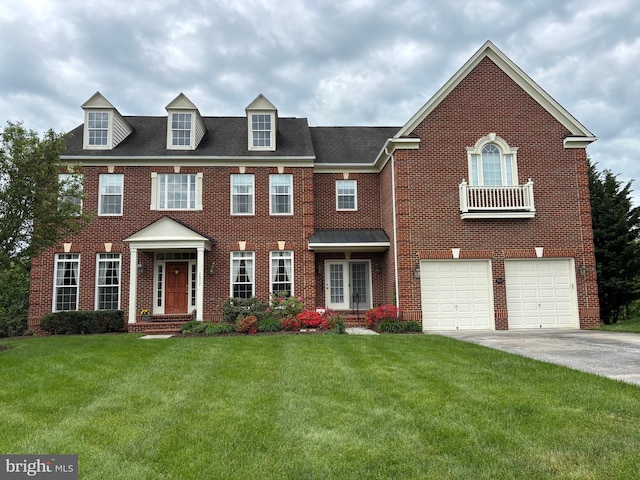 1517 Brookdale Ct, Winchester, VA 22601 - colonial home with brick siding, a front lawn, concrete driveway, and a garage