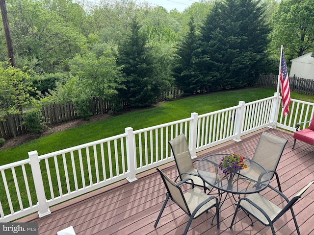 1517 Brookdale Ct, Winchester, VA 22601 - wooden deck with outdoor dining space and a view of trees