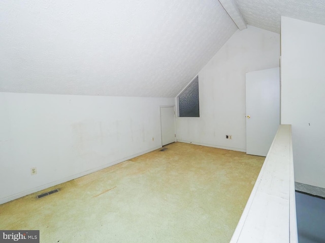524 Ridge Rd, Annapolis, MD 21401 - additional living space featuring lofted ceiling, a textured ceiling, carpet, and baseboards
