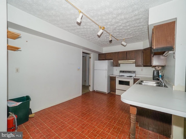 524 Ridge Rd, Annapolis, MD 21401 - kitchen with white appliances, a sink, under cabinet range hood, brick patterned floors, and light countertops