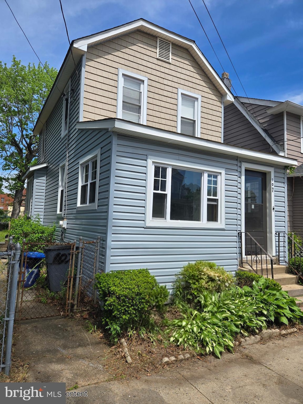 107 Brinton Ave, Trenton, NJ 08618 - view of front facade with fence
