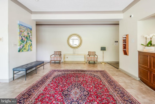 sitting room featuring baseboards