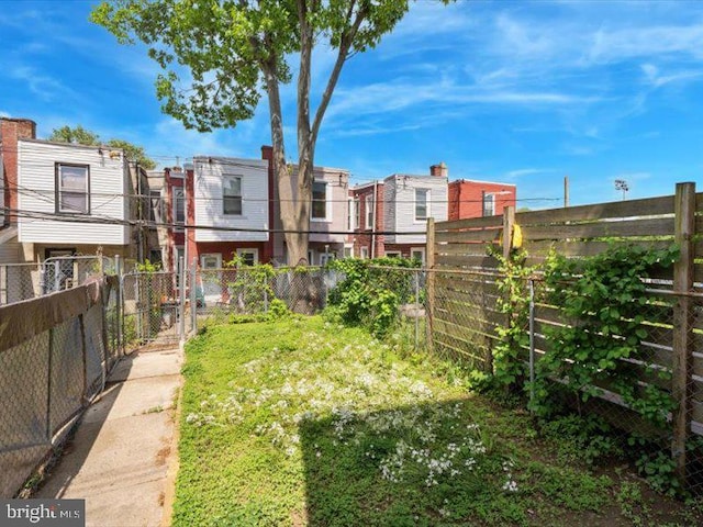 view of yard with fence