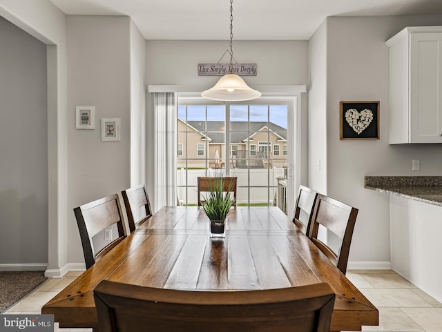 166 Spring Dale Ln, Felton, DE 19943 - dining area with light tile patterned flooring and baseboards