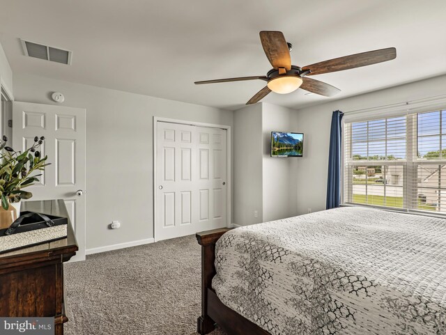 166 Spring Dale Ln, Felton, DE 19943 - bedroom with carpet flooring, baseboards, a closet, and ceiling fan