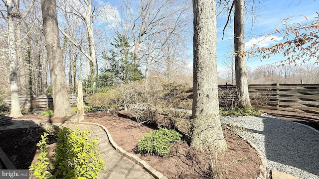 view of yard with fence