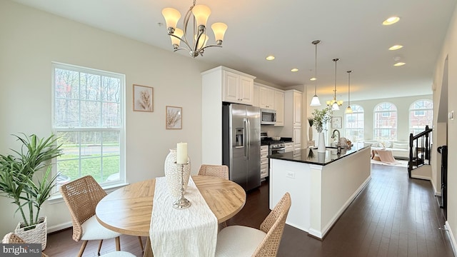 12515 Rustic Rock Ln, Beltsville, MD 20705 - dining room featuring a chandelier, recessed lighting, and dark wood-type flooring