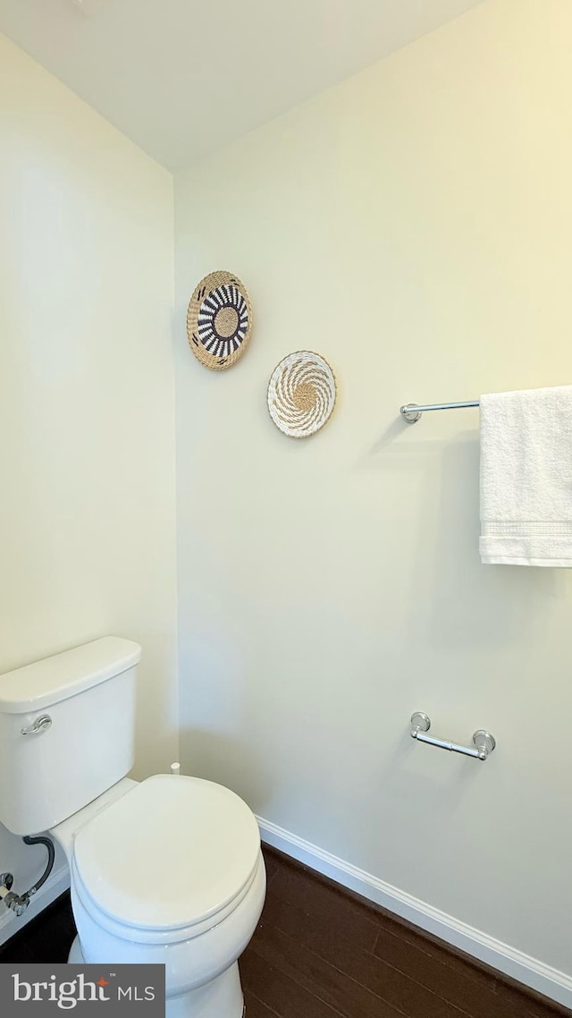 12515 Rustic Rock Ln, Beltsville, MD 20705 - bathroom with baseboards, toilet, and wood finished floors