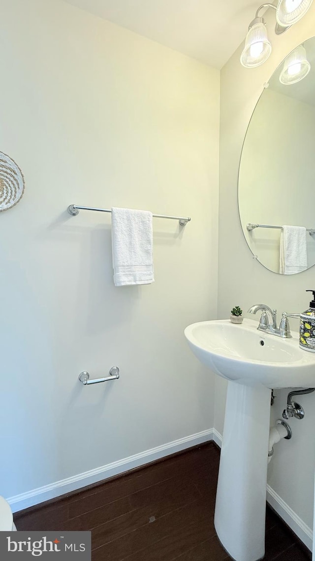 12515 Rustic Rock Ln, Beltsville, MD 20705 - bathroom featuring baseboards and a sink