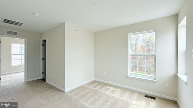 12515 Rustic Rock Ln, Beltsville, MD 20705 - carpeted spare room featuring healthy amount of natural light and baseboards