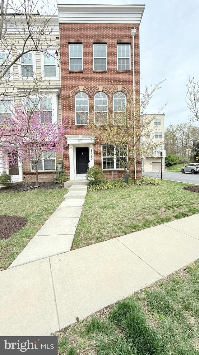 12515 Rustic Rock Ln, Beltsville, MD 20705 - view of front of property with brick siding and a front lawn