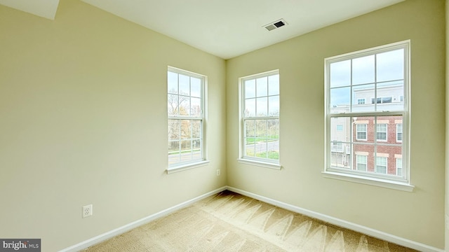 12515 Rustic Rock Ln, Beltsville, MD 20705 - empty room featuring baseboards and carpet flooring