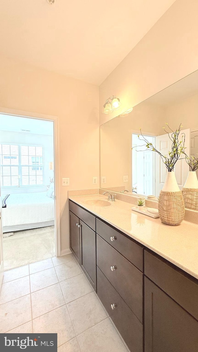 12515 Rustic Rock Ln, Beltsville, MD 20705 - bathroom featuring tile patterned floors, vanity, connected bathroom, and baseboards