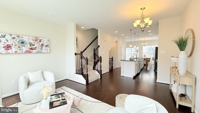 12515 Rustic Rock Ln, Beltsville, MD 20705 - living room featuring a chandelier, dark wood finished floors, stairs, recessed lighting, and baseboards