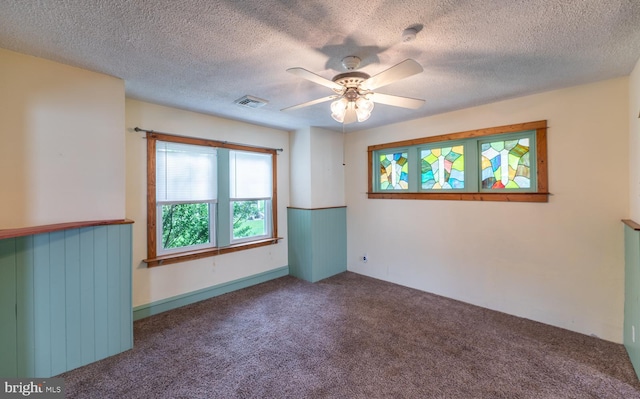 506 W 3rd St, Birdsboro, PA 19508 - unfurnished room with carpet flooring, a ceiling fan, and a textured ceiling
