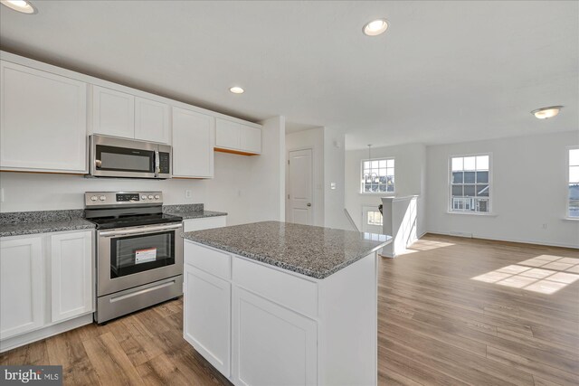 1 Little Way Unit 79, Hanover, PA 17331 - kitchen with stainless steel appliances, light wood-type flooring, white cabinetry, recessed lighting, and light stone countertops