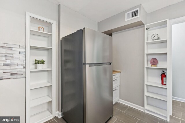 4850 Eastern Ave NE, Washington, DC 20017 - kitchen featuring freestanding refrigerator, built in features, and open shelves