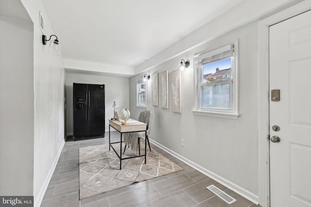 4850 Eastern Ave NE, Washington, DC 20017 - tiled foyer featuring baseboards