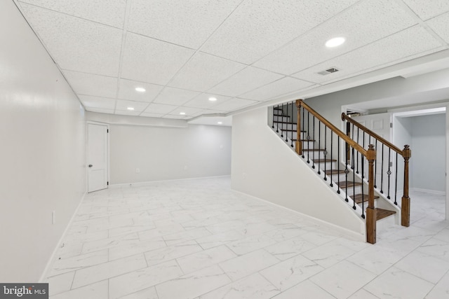 4850 Eastern Ave NE, Washington, DC 20017 - finished basement featuring stairs, recessed lighting, marble finish floors, baseboards, and a drop ceiling