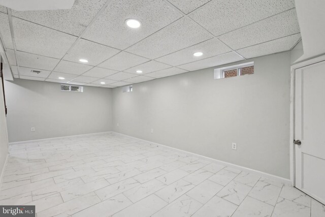 4850 Eastern Ave NE, Washington, DC 20017 - below grade area featuring recessed lighting, light marble finish flooring, and baseboards