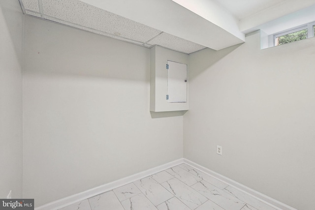 4850 Eastern Ave NE, Washington, DC 20017 - basement with light marble finish flooring and baseboards