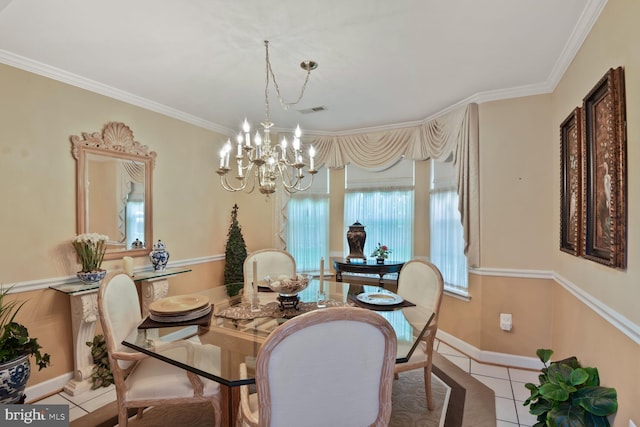 dining area featuring tile patterned floors, a chandelier, crown molding, and baseboards