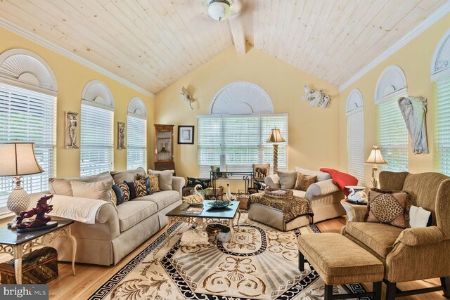 living room featuring light wood-style flooring, wooden ceiling, and ornamental molding