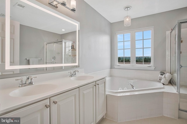 455 Creeks End Ln, Stevensville, MD 21666 - bathroom featuring a shower stall, a tub with jets, double vanity, and tile patterned floors