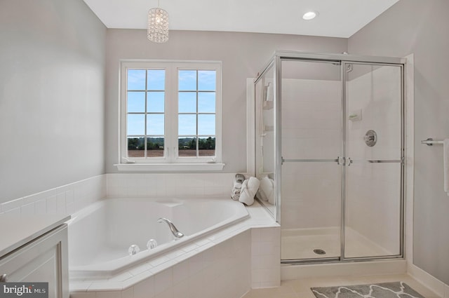 455 Creeks End Ln, Stevensville, MD 21666 - bathroom featuring a garden tub, a stall shower, and tile patterned flooring