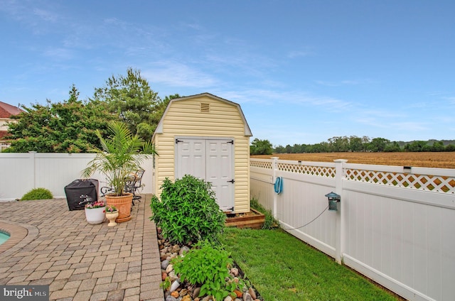 455 Creeks End Ln, Stevensville, MD 21666 - view of shed featuring a fenced backyard