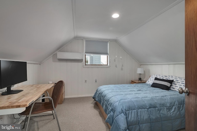 carpeted bedroom with a wall mounted air conditioner, lofted ceiling, and an office area