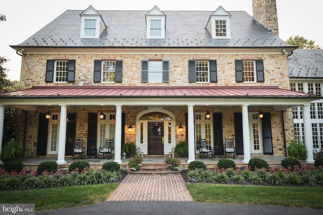1912 Corbridge Ln, Monkton, MD 21111 - view of front facade with french doors, a porch, a chimney, and a high end roof