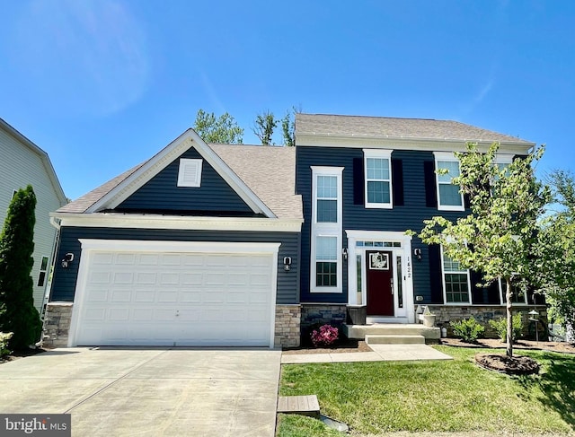 1422 Silver Oak Ln, Arnold, MD 21012 - view of front of house featuring stone siding, driveway, a garage, and a front lawn
