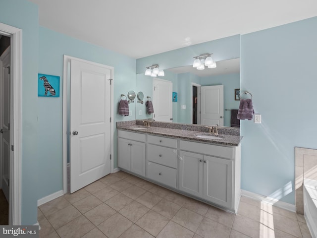 1422 Silver Oak Ln, Arnold, MD 21012 - bathroom featuring double vanity, a bath, tile patterned floors, and baseboards