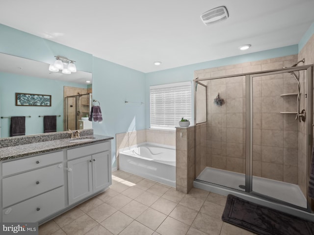 1422 Silver Oak Ln, Arnold, MD 21012 - full bathroom featuring vanity, tile patterned flooring, a garden tub, and a stall shower