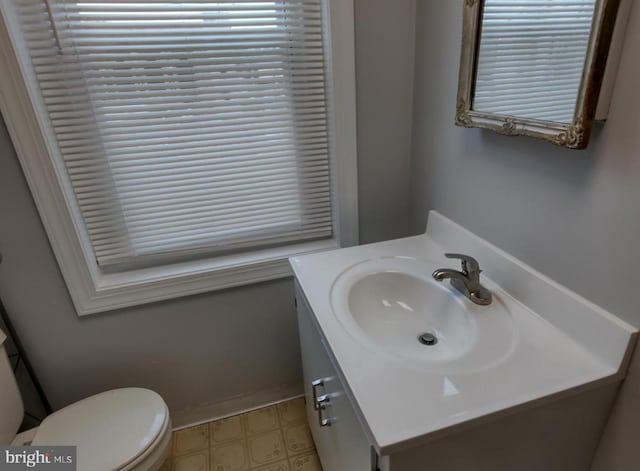138 W 4th St, Bridgeport, PA 19405 - bathroom featuring vanity, tile patterned floors, and toilet