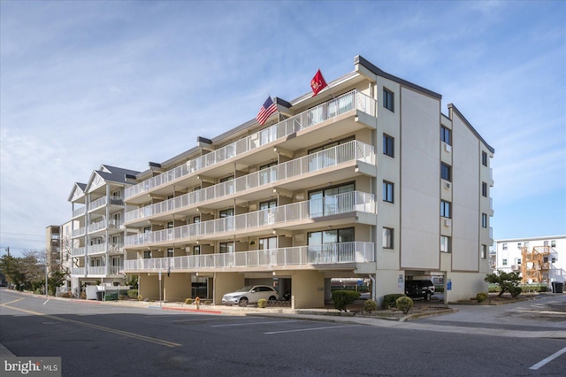 8 35th St Unit 401, Ocean City, MD 21842 - view of apartment building / complex featuring uncovered parking